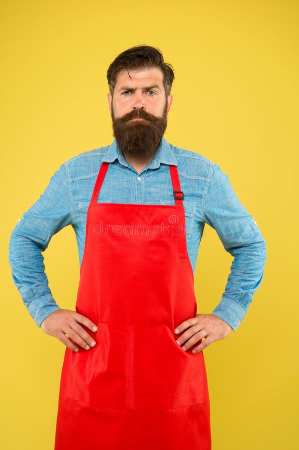 Bearded Man In Cook Uniform Mature Shop Assistant Chef In Red Apron Restaurant Staff Cooking 