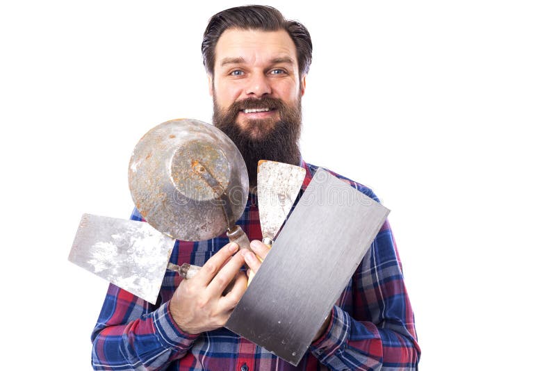 Bearded man holding used masonry tools isolated on white stock photo Bearded man holding used masonry tools isolated on white stock photo