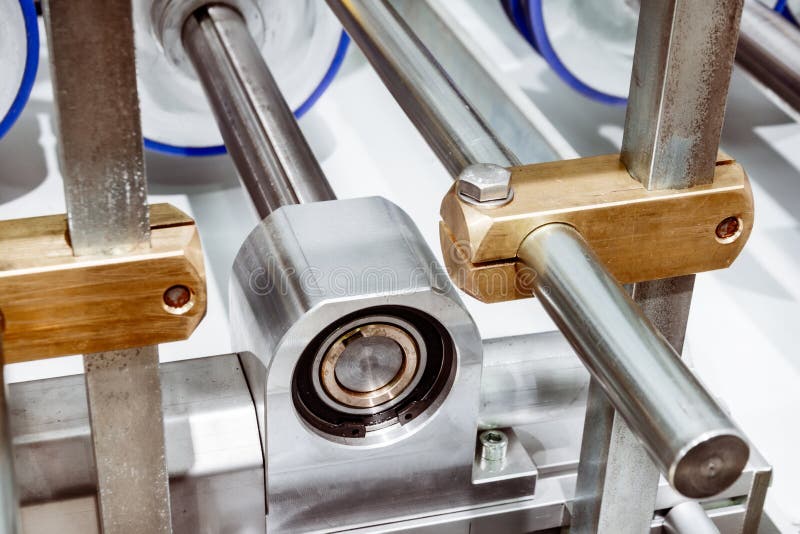 Bearing Assembly of the Roller Conveyor. Stock Image Image of silver