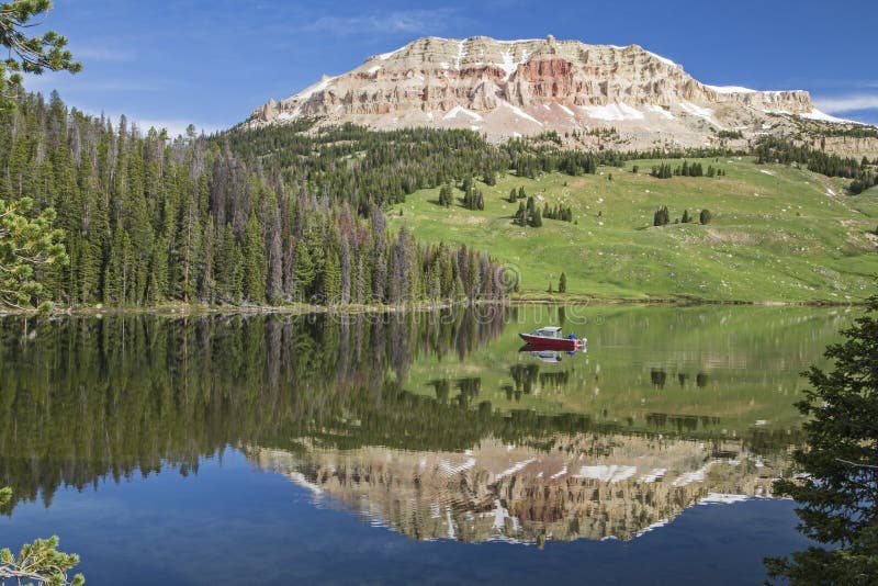 Beartooth Butte and Bear Lake with fishing boat