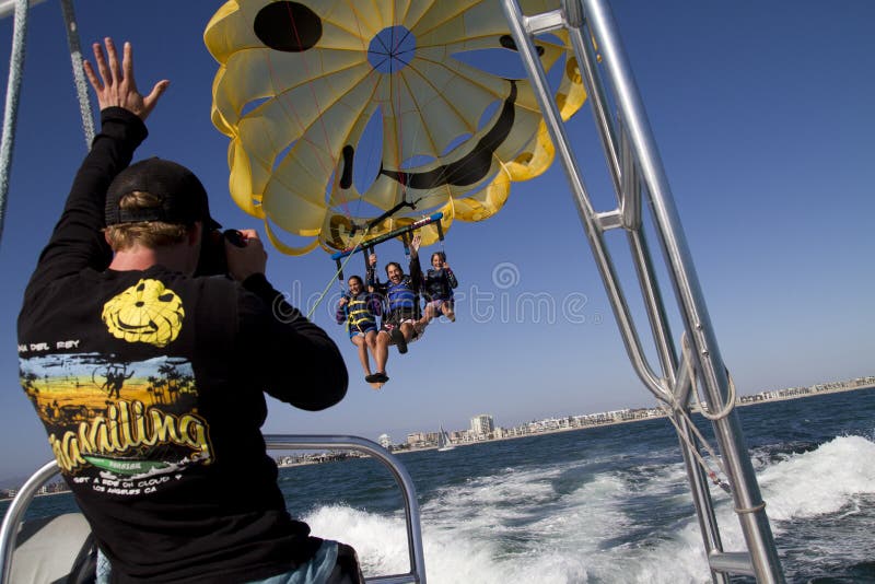 Families from around the nation escape their states steamy summer heat to get relief while on vacations in Southern California. Here we have a trio enjoying the cool breeze of para-sailing on the Pacific Ocean. Families from around the nation escape their states steamy summer heat to get relief while on vacations in Southern California. Here we have a trio enjoying the cool breeze of para-sailing on the Pacific Ocean.