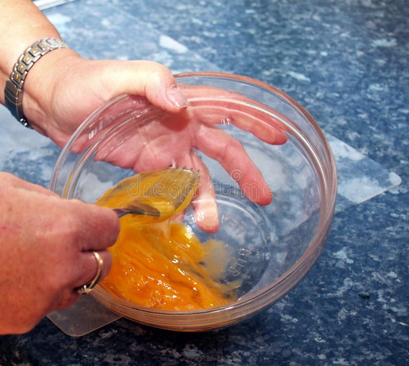 Beating an egg stock image. Image of poach, whisk, yolk 1425435