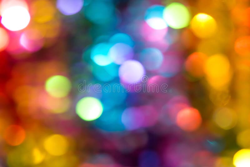 Beau fond multicolore de scintillement de vacances de lumières de bokeh pour la célébration d'anniversaire de nouvelle année de N