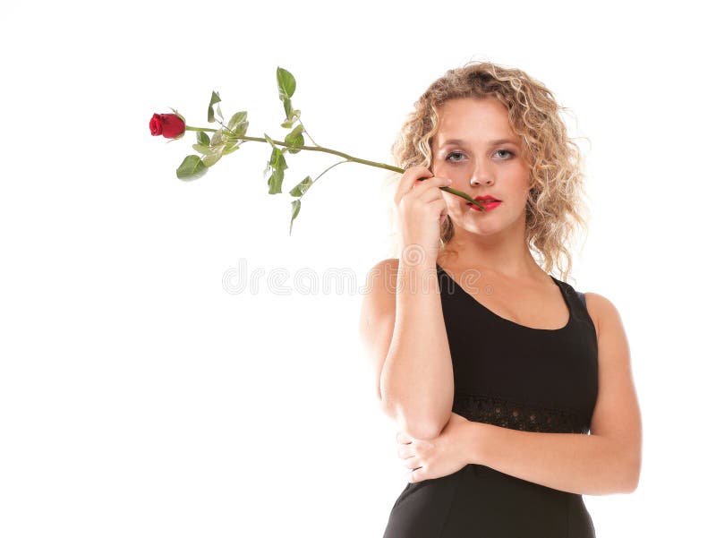 Beau romantique blond de jeune femme s'est levé photographie stock libre de droits Beau romantique blond de jeune femme s'est levé photographie stock libre de droits