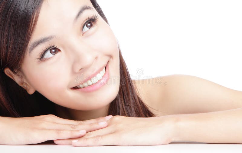 Beau visage asiatique de sourire de femme photographie stock Beau visage asiatique de sourire de femme photographie stock