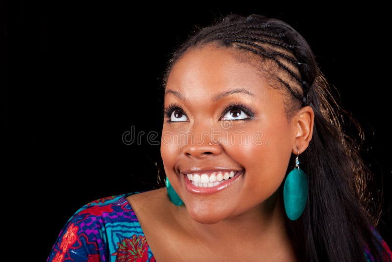 Beautiful African American woman looking up