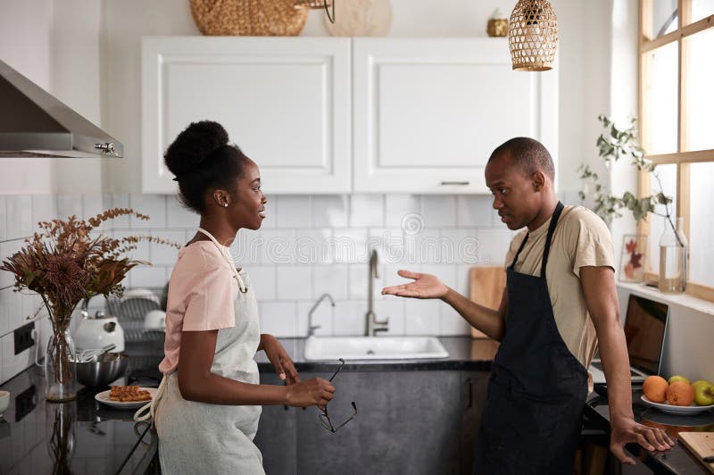 Beautiful african couple have conversation in the kitchen