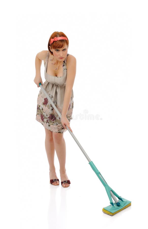 Beautiful angry house woman cleaning the floor