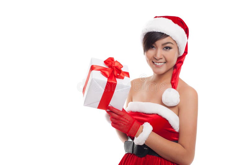 Beautiful Asia woman wear Santa Clause costume, christmas girl h. Appy smile hold new year gift box present, in isolated on white background royalty free stock photo Beautiful Asia woman wear Santa Clause costume, christmas girl h. Appy smile hold new year gift box present, in isolated on white background royalty free stock photo
