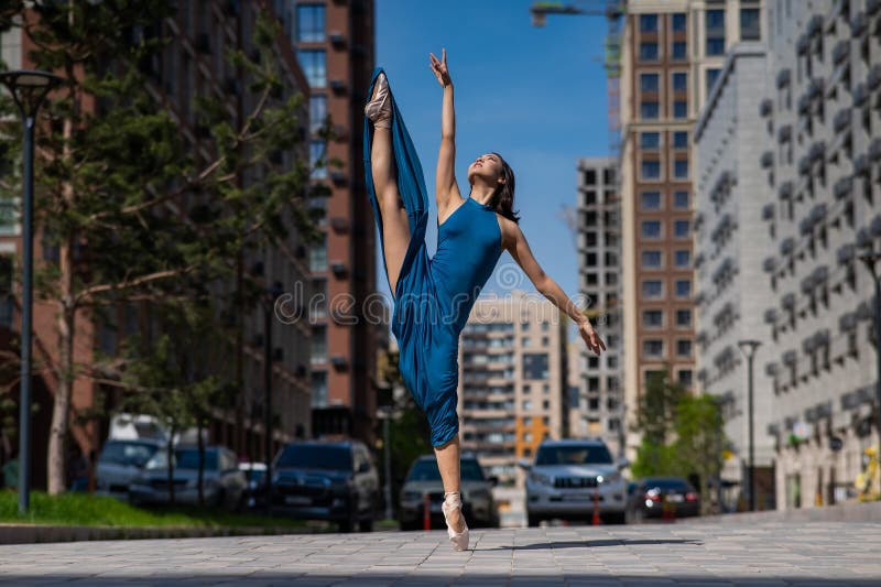 Beautiful Asian Ballerina in Blue Dress Posing in Splits Outdoors ...