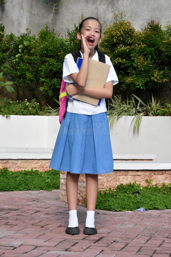 Beautiful Asian Female Student Yelling Standing