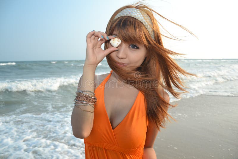 Beautiful Asian girl at the beach stock photography Beautiful Asian girl at the beach stock photography