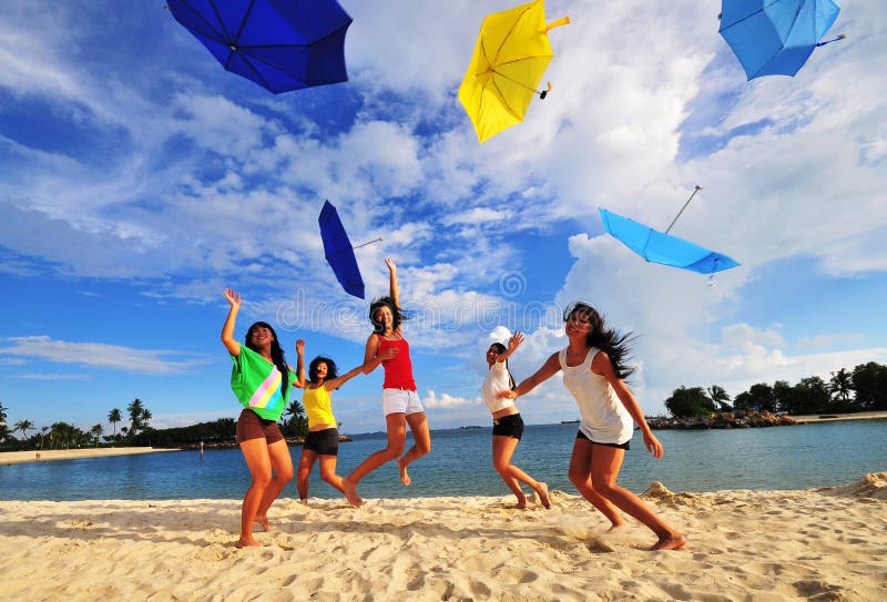 Beautiful Asian Girls having Fun at the Beach