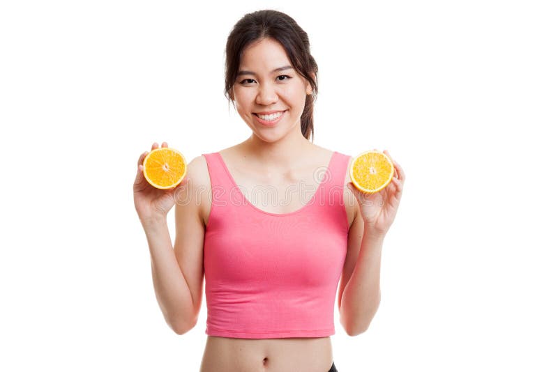 Beautiful Asian healthy girl with orange fruit. stock photo Beautiful Asian healthy girl with orange fruit. stock photo
