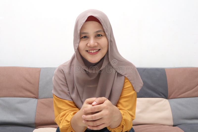 Muslim Call Girl Xxx Video - Beautiful Asian Muslim Lady Doing Selfie Portrait on Phone or Doing Video  Call while Sitting on Sofa, Happy Smiling Cheerful Stock Photo - Image of  cheerful, looking: 188300988