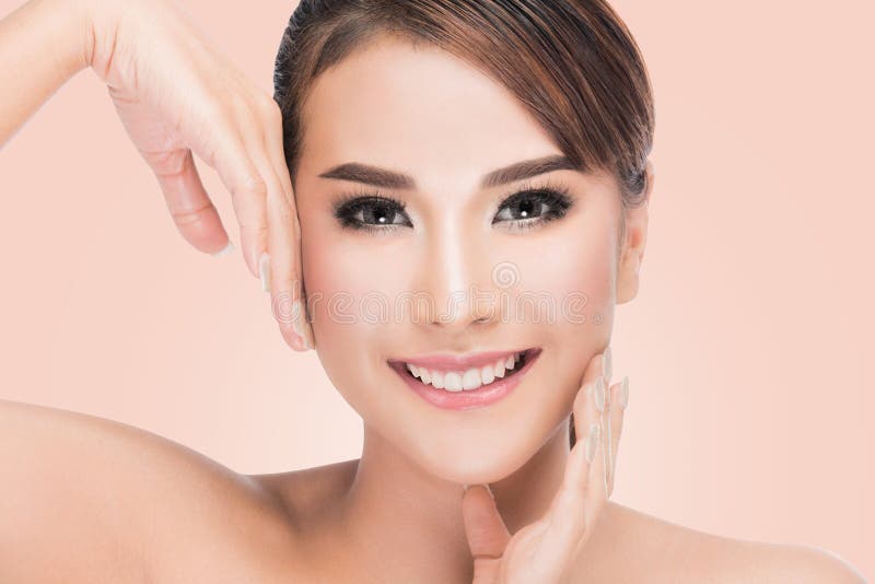 Beautiful Asian woman cares for the skin face, Beautiful Spa Woman Touching her Face stock images Beautiful Asian woman cares for the skin face, Beautiful Spa Woman Touching her Face stock images
