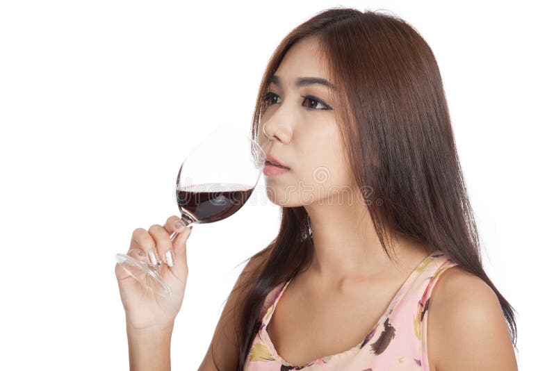 Beautiful Asian woman drink red wine