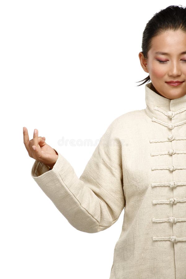 Beautiful asian woman make kung fu gesture