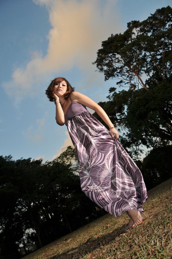 Beautiful Asian Woman In The Park