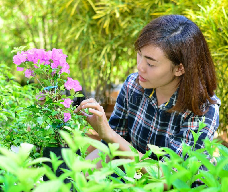 Beautiful asian women in flowers garden