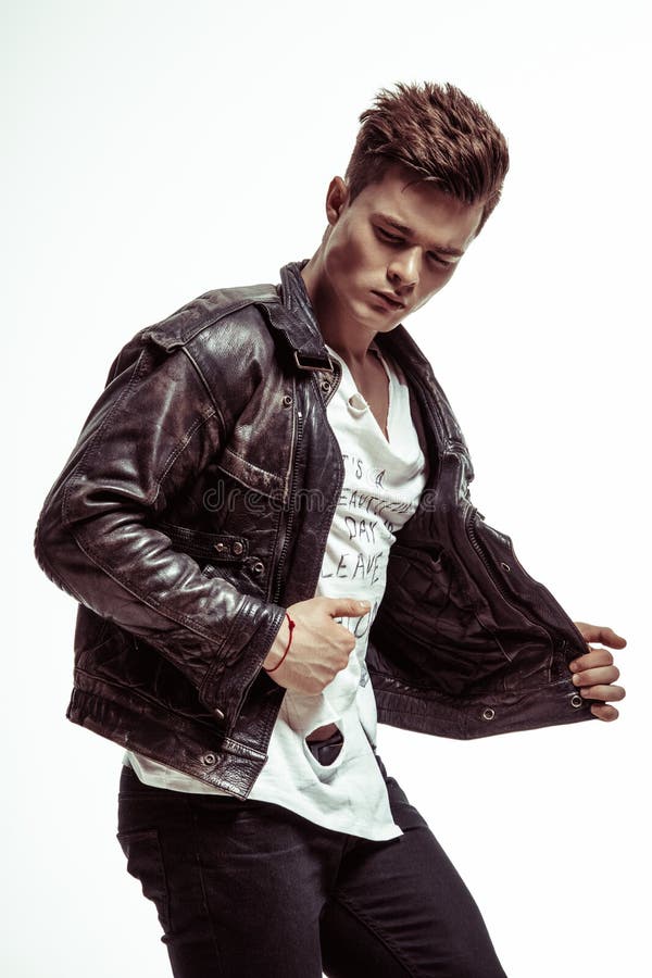 Beautiful Athletic Bodybuilder Male Model Posing in Studio. Expression