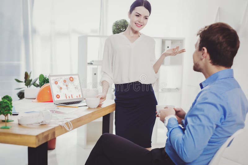 Beautiful attractive woman talking to her colleague stock photography Beautiful attractive woman talking to her colleague stock photography