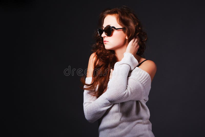 Beautiful attractive young girl in sunglasses