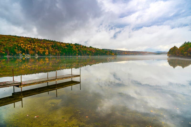 Beautiful Autumn Reflections on New England Lake stock photo Beautiful Autumn Reflections on New England Lake stock photo
