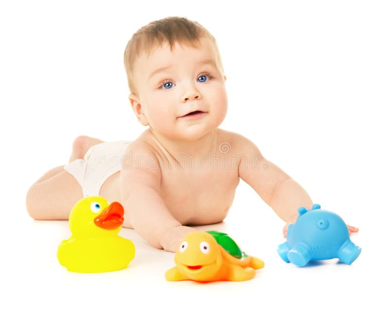 Beautiful baby crawling and playing with toys