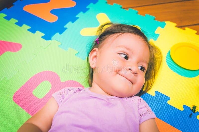 Beautiful baby girl lying down