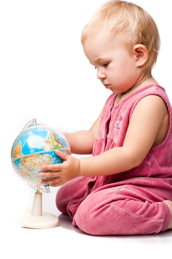 Beautiful baby holding a globe