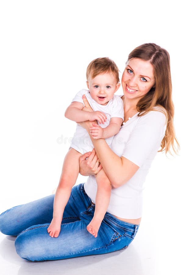 Beautiful baby and mother playing