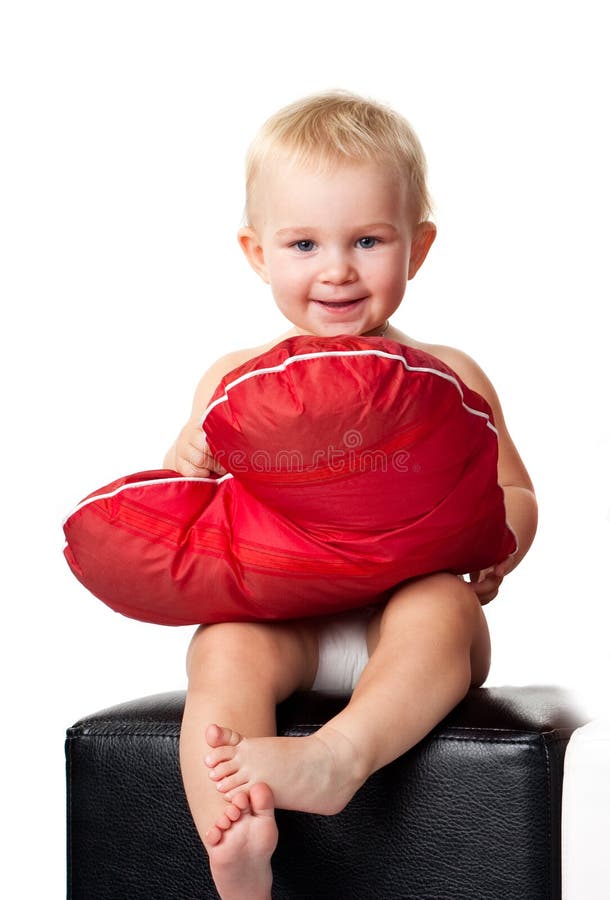 Beautiful Baby Sitting with Heart Shaped Pillow Stock Image Image of