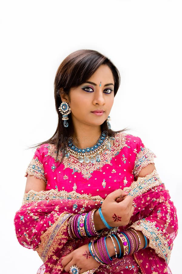 Beautiful Bangali bride in colorful dress, isolated