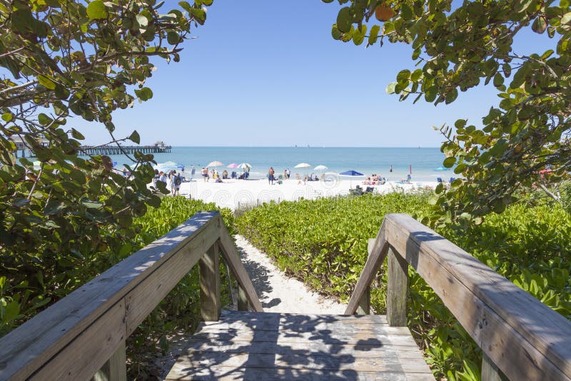 Pier at beach stock image. Image of pillar, destination - 236273