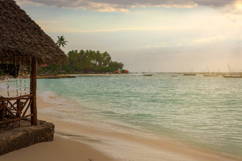 A wonderful beach with Several fishing boats stock photos A wonderful beach with Several fishing boats stock photos