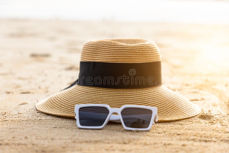 Beautiful Beach with Sunglasses and Hat on the Beach Stock Image