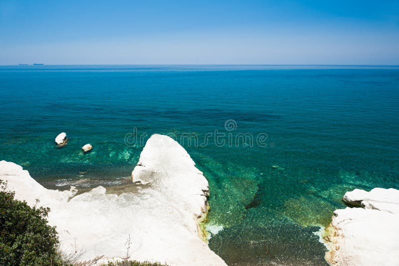 Beautiful beach with white cliff and blue sea royalty free stock photos