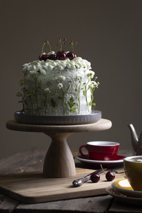 Beautiful biscuit cake with sweet cherry