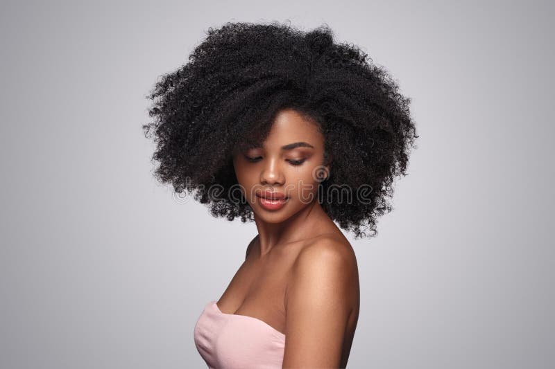 Side profile portrait of a beautiful black woman. Stock Photo
