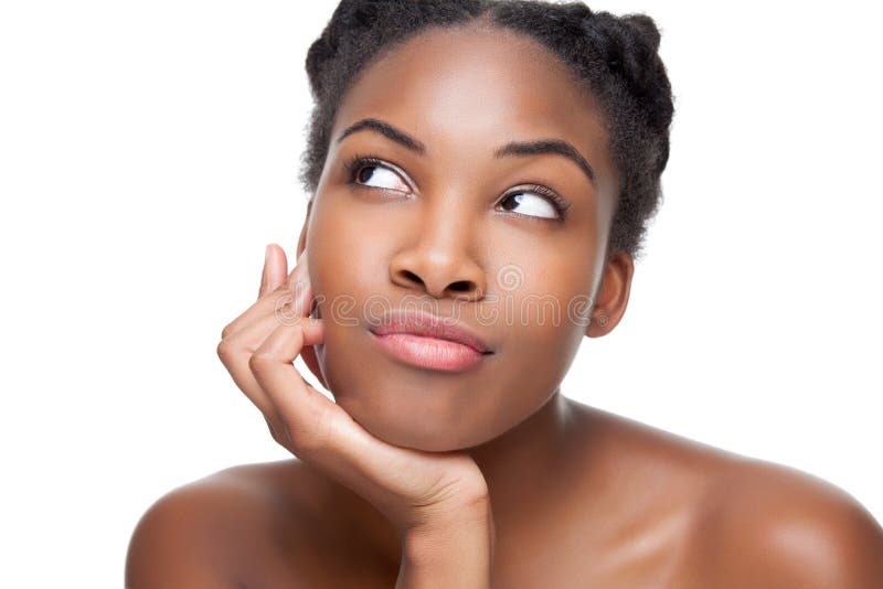 Beautiful young black woman looking up. Beautiful young black woman looking up