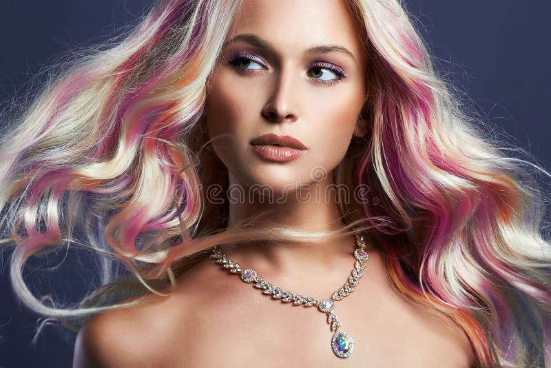 Beautiful girl with colorful hair and jewelry royalty free stock photos Beautiful girl with colorful hair and jewelry royalty free stock photos