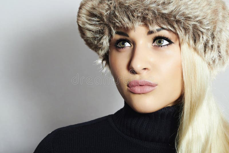 Beautiful Blond Woman in Fur Hat. Beauty Fashion Girl. Winter Style ...