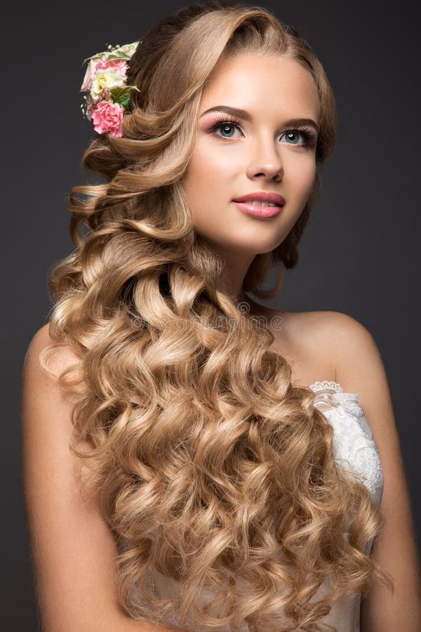 Beautiful blond woman in image of the bride with