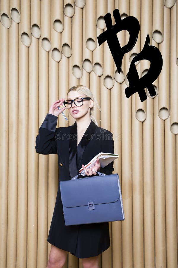 Beautiful blond woman showing standing near bitcoin sketch. Virtual money or btc crush concept. Cryptocurrency. stock photos Beautiful blond woman showing standing near bitcoin sketch. Virtual money or btc crush concept. Cryptocurrency. stock photos