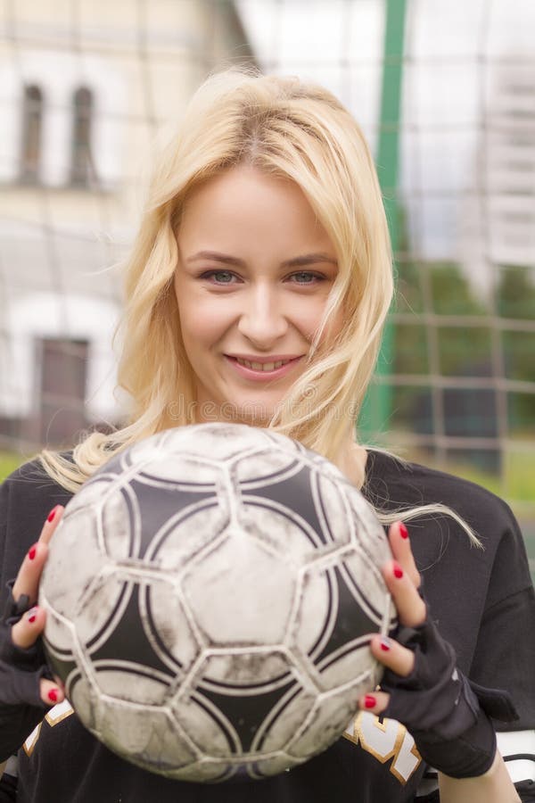 Beautiful Blonde With A Ball At The Football Goal Stock Image Image