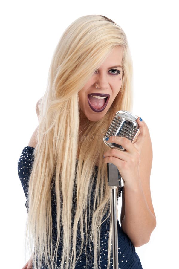 Beautiful blonde female singer in blue dress