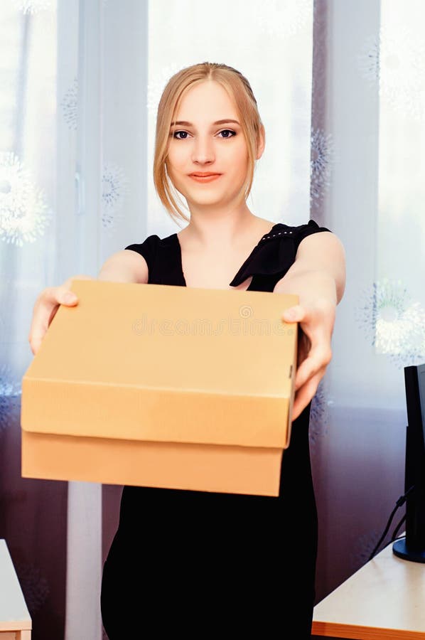Beautiful Blonde Girl Holding a Box on Her Hands Stock Photo Image of