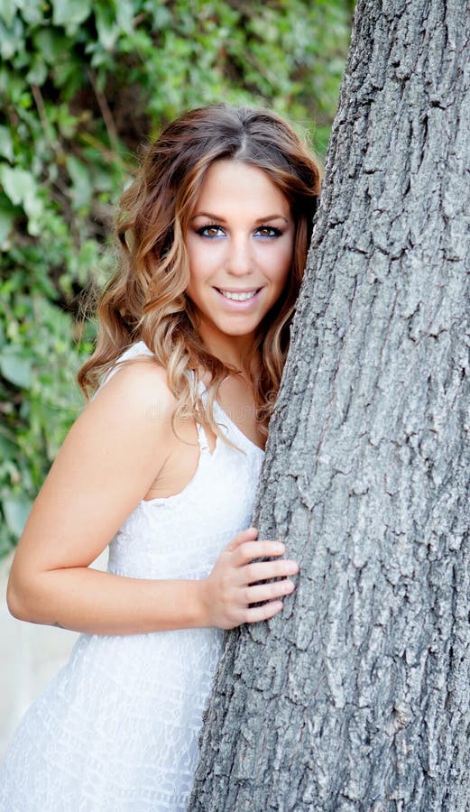 Beautiful Blonde Girl Next To A Tree Stock Image Image Of Green