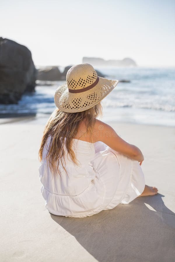 Beautiful Blonde in Sundress Sitting on the Beach Stock Photo - Image ...
